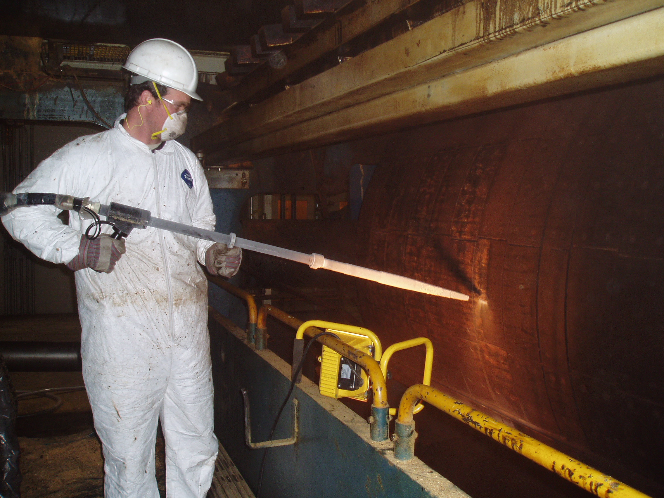 dry ice blast cleaning a conveyor